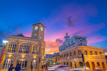Pink cloud in blue sky above The classic building in Phuket old town. Scene of romantic beautiful...