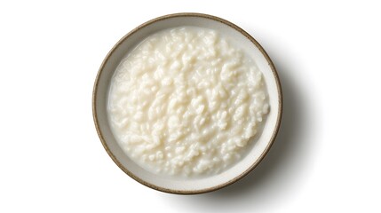 Creamy rice porridge in rustic bowl on white background