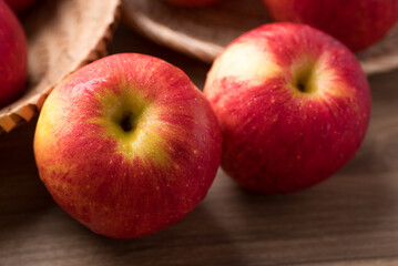 Red apple fruit (Envy apple) on wooden background, Close up