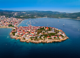Primosten, Croatia - Aerial view of Primosten peninsula and old town with red rooftops and St....