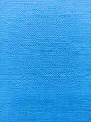 Blue fabric texture useful as a background in your design, vertical image