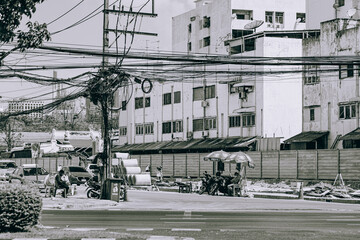black and white photo of a street in Bangkok