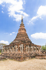 Obraz premium Wat Sorasak, a chedi surrounded by elephants in Sukhothai, Thailand