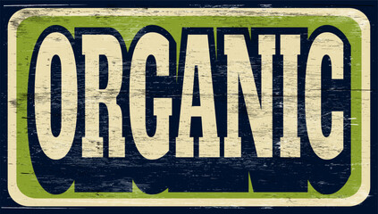 Fototapeta premium Aged vintage organic sign on wood