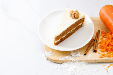 Slice of sweet carrot cake. Closeup.
