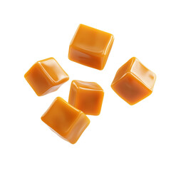 Delicious caramel cubes on a black background