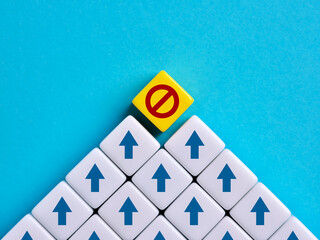 To stop or prevent the progress. To ban any action or movement.