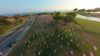 This stunning aerial view showcases 3,000 flags representing various nationalities, serving as a poignant tribute to 911, symbolizing remembrance and unity among diverse peoples