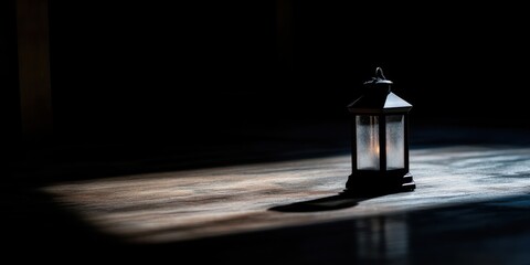 An antique lantern emits a gentle light in a dark room, symbolizing warmth, nostalgia, and the timeless elegance of vintage lighting, creating an intimate atmosphere.