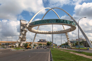 The famous Biswa Bangla Gate, an amusement center at Rajarhat, along with view of morning traffic on the city road at Kolkata, India