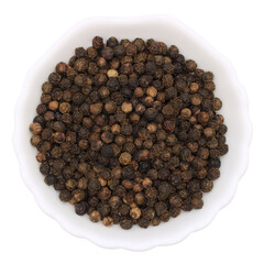 Round black pepper in a white plate. Spice for cooking