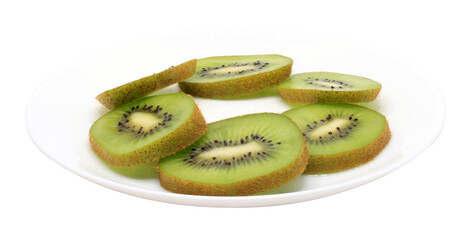 Round kiwi slices in a white plate on a transparent background. Side view