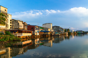Fototapeta premium People's houses along the Bang Nara River Narathiwat Province, Thailand.