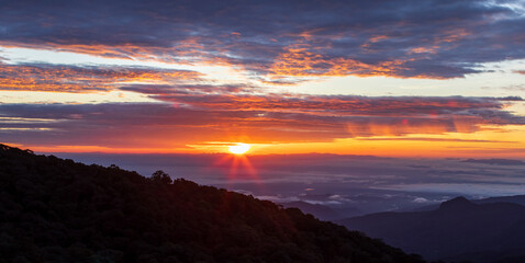 Panoramic view of the mountains during sunrise.