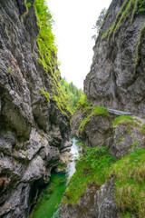 Nature in the Tiefenbachklamm between Kramsach and Brandenberg. Landscape with a river and rocks in the Alpbachtal.
