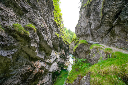 Nature in the Tiefenbachklamm between Kramsach and Brandenberg. Landscape with a river and rocks in the Alpbachtal.
