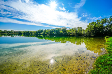 View of Lake Unterschleissheim with the surrounding nature.  Bathing lake in the landscape protection area of ​​the Unterschleißheim district of Riedmoos in the Munich district.

