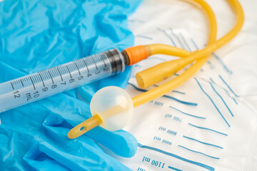 Foley urinary catheter with urine bag for disability or patient in hospital.