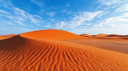 Golden sand dunes extend infinitely under a bright blue sky, highlighting the grandeur of nature. The intricate patterns in the dunes create depth and intrigue in this vast landscape