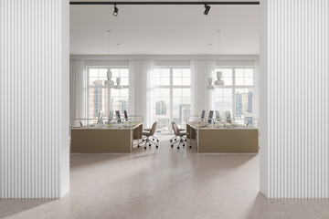 Modern coworking interior with pc computers and tables, entrance and window