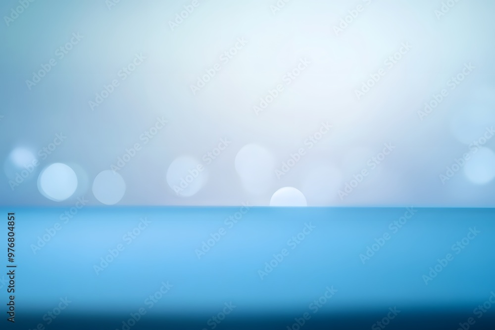 Poster a soft blue gradient background with bokeh lights, ideal for presentations or designs.