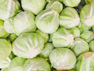 Cabbage. Fresh Green Cabbage. Background of ripe cabbage, top view. Green cabbage in the market.