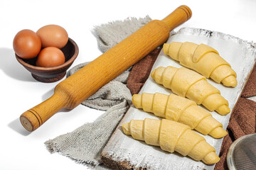 Frozen croissants, the process of making a traditional dessert. Comfort food, classic breakfast