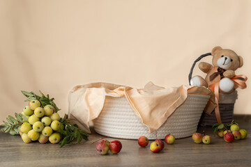 Empty wicker basket decorated with small apples empty showcase for presentation of natural...