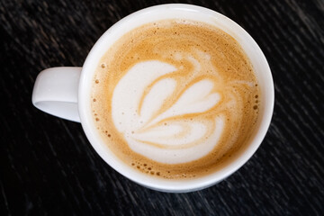 A cup of coffee wirg milk foam