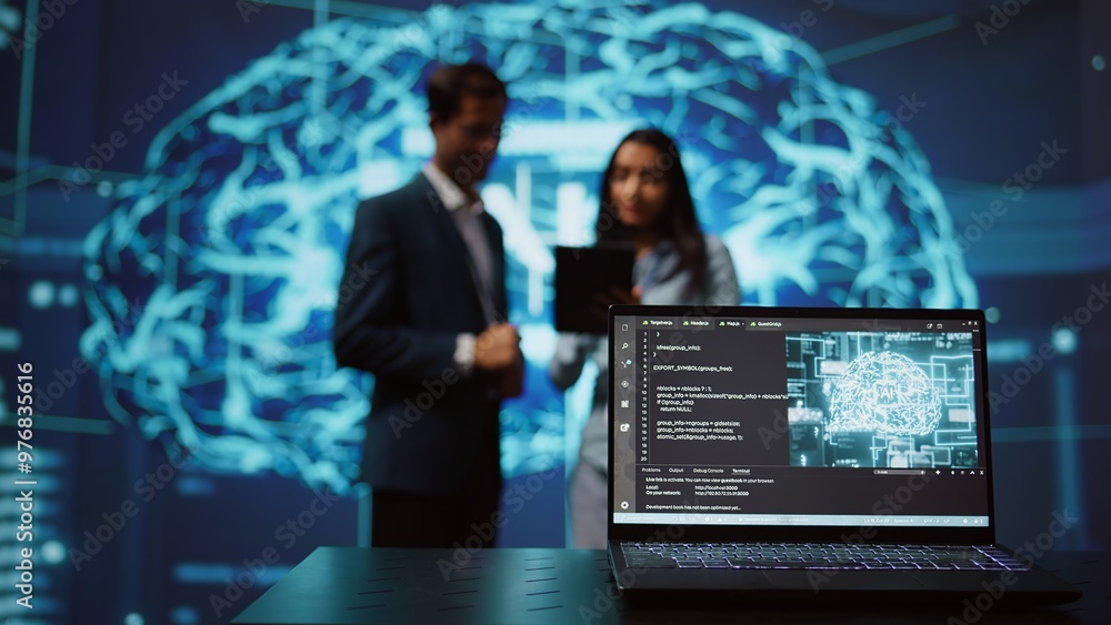Poster focus on laptop in workspace used by ai researchers working with artificial intelligence in blurry b