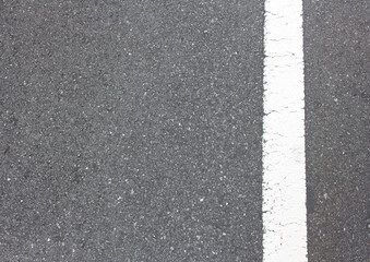 Asphalt texture with white line.  White line on the road background with copy space.
