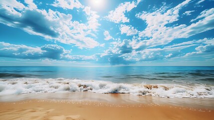 Fototapeta premium A sandy beach under a brilliant sky