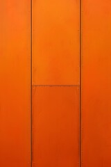 A solid orange surface with a subtle texture and seams.