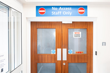 Off limits to patients, the No Access Staff Only sign leads to medical wards and admin areas. A key...