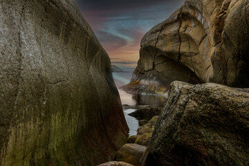 narrow bay, beautiful sunset that reflects in the water