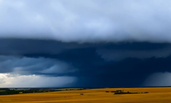 thunderstorm clouds rolling over vast open plains