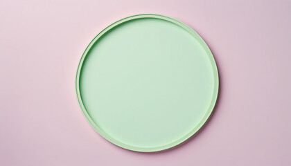 Green pastel circle frame on a light pink background, minimalist style.
