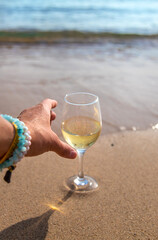 Glasses of wine on the seashore. Selective focus.