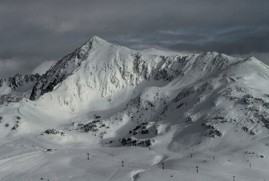 Majestic snowy peaks of the Pyrenees in grayscale