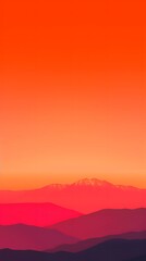 Obraz premium A vibrant gradient sunset over mountains, creating a serene and calming atmosphere.