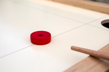 Novus table, cue in hand and novus dice, game with hitting the target. Red dice