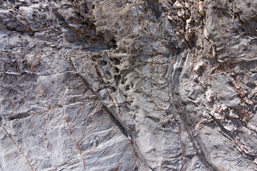 Close up of weathered lava rock from Hemmick beach, Cornwall.