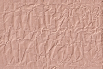 Wrinkled brown kraft paper textured background