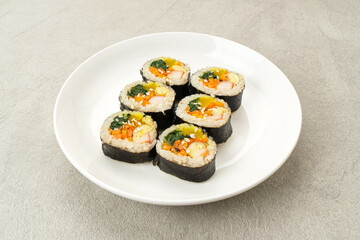 Korean Rolled Gimbap, made of rice, cucumber, tuna, carrot, sausage, crab stick and wrapped with seaweed laver. 
