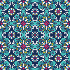 A vibrant and intricate pattern featuring floral and geometric designs in bright colors on a soothing blue background.