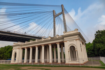Historic colonial architecture structure at Princep Ghat, with view of the famous Vidyasagar Setu...
