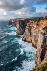 majestic cliffs overlooking the crashing waves bel photo