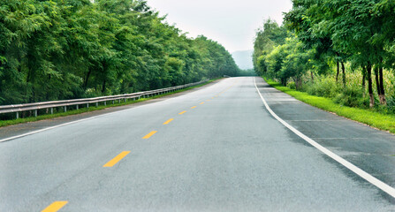 Winding road through a low mountain