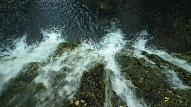 Parga Waterfall Plunging Into Natural Basin In Zas - A Coru&ntilde;a, Spain. overhead shot