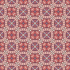 A repeating geometric pattern featuring intricate designs with circular and floral elements in warm colors.